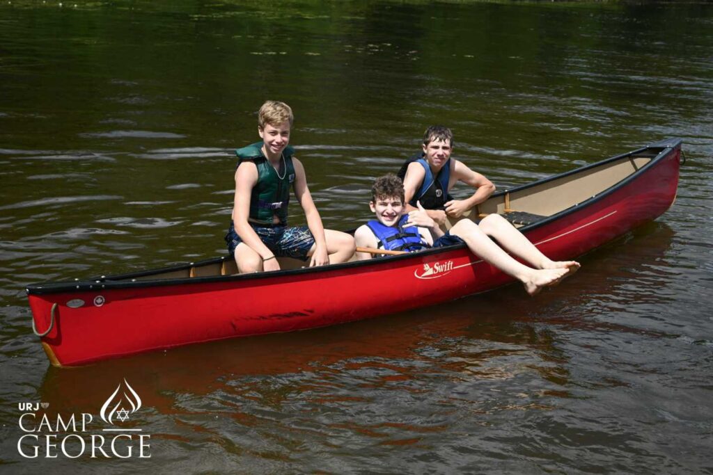 campers canoeing